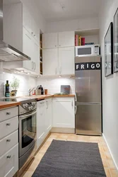 Kitchen with gray refrigerator photo