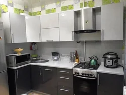 Kitchen With Gray Refrigerator Photo