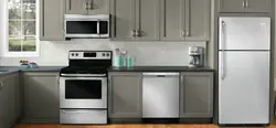Kitchen With Gray Refrigerator Photo