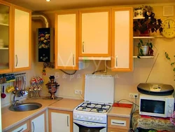 Small kitchens with gas boiler interior photo