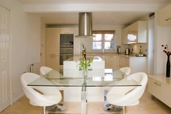 Kitchen interior with glass table photo