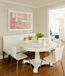 Round table and sofa in the kitchen photo