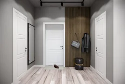 Photo of a hallway with a gray door