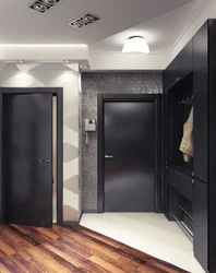 Photo of a hallway with a gray door