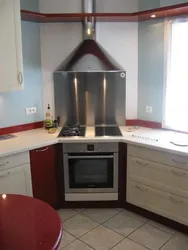 If the stove is in the corner of the kitchen photo
