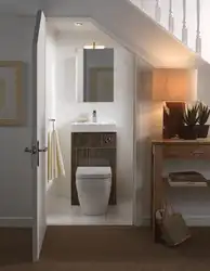 Home design bathroom under the stairs