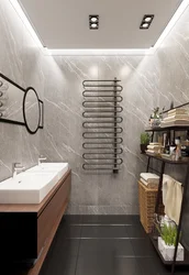 Black heated towel rail in the bathroom design