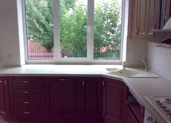 Countertop with a window in the kitchen photo in the house
