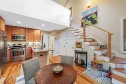 Living room kitchen design with stairs in a modern style