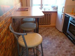 Table in a small kitchen design photo Khrushchev
