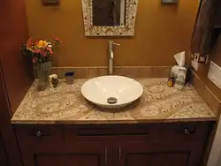 Tile Countertop In The Bathroom Under The Sink Photo