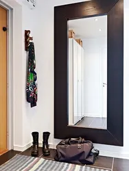 Wall-mounted full-length mirror in the hallway photo in the interior