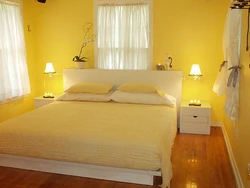 Bedroom with yellow wallpaper photo
