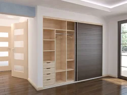 Built-in compartment doors in the hallway photo