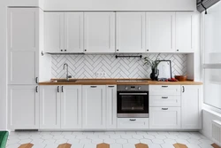 Corner White Kitchen With Wooden Countertop Photo In The Interior