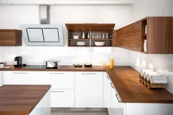 Corner White Kitchen With Wooden Countertop Photo In The Interior