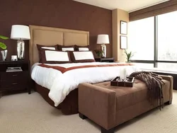 What colors goes with brown in a bedroom interior photo