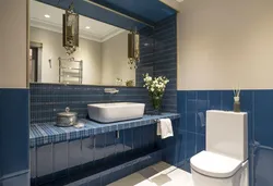 Blue wall in the bathroom interior