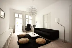 Bright Apartment With Dark Furniture Photo