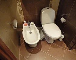 Photo Of Bidet And Toilet In The Bathroom