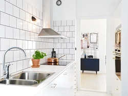 Ceramic tiles on the walls in the kitchen photo