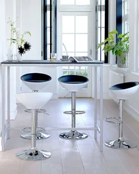 Bar stools in the kitchen for the bar counter photo