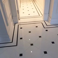 White Tiles On The Hallway Floor Photo