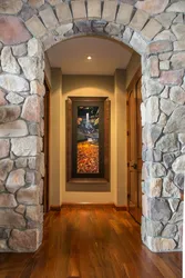 Door in the hallway made of stone photo