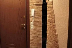 Door In The Hallway Made Of Stone Photo