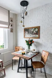 How to decorate a wall in the kitchen near the table photo