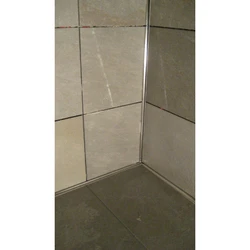 Corners on bathroom tiles photo