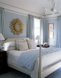 Bedroom design in beige and blue tones