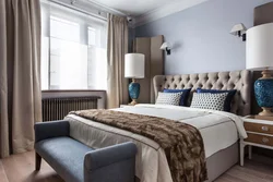 Bedroom design in beige and blue tones