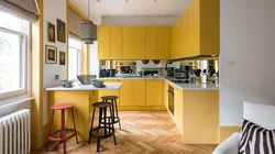 What colors does yellow go with in the kitchen interior?