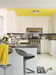 What color goes with yellow in the kitchen interior photo how