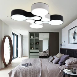 Modern lamps in the bedroom interior photo