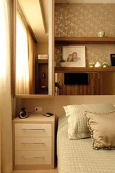 Small bedroom with bed and wardrobe photo