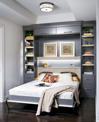 Small bedroom with bed and wardrobe photo