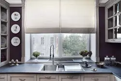 Kitchen design with kitchen unit by the window