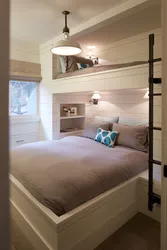 Photo of a small bedroom with a bed