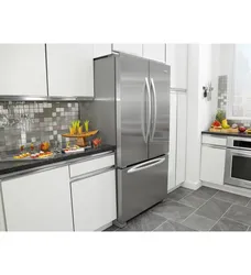 Kitchen with silver refrigerator design