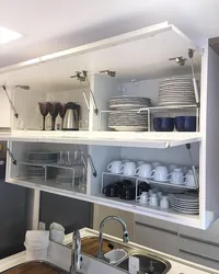 Organizing storage in the kitchen photo