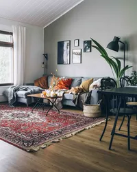 Interior with red carpet on the living room floor