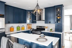 Blue kitchen with white fittings photo