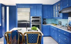 Blue kitchen with white fittings photo