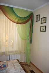 Tulle in the bedroom on one side photo