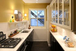 Design Of A Narrow Kitchen In A House With A Window
