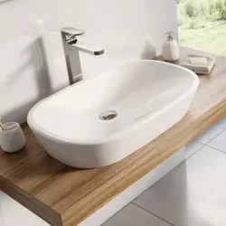 Photo Of A Bathtub With A Bowl Sink