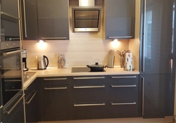 Photo Of A Built-In Kitchen In An Apartment With Appliances