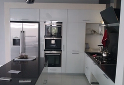 Photo Of A Built-In Kitchen In An Apartment With Appliances